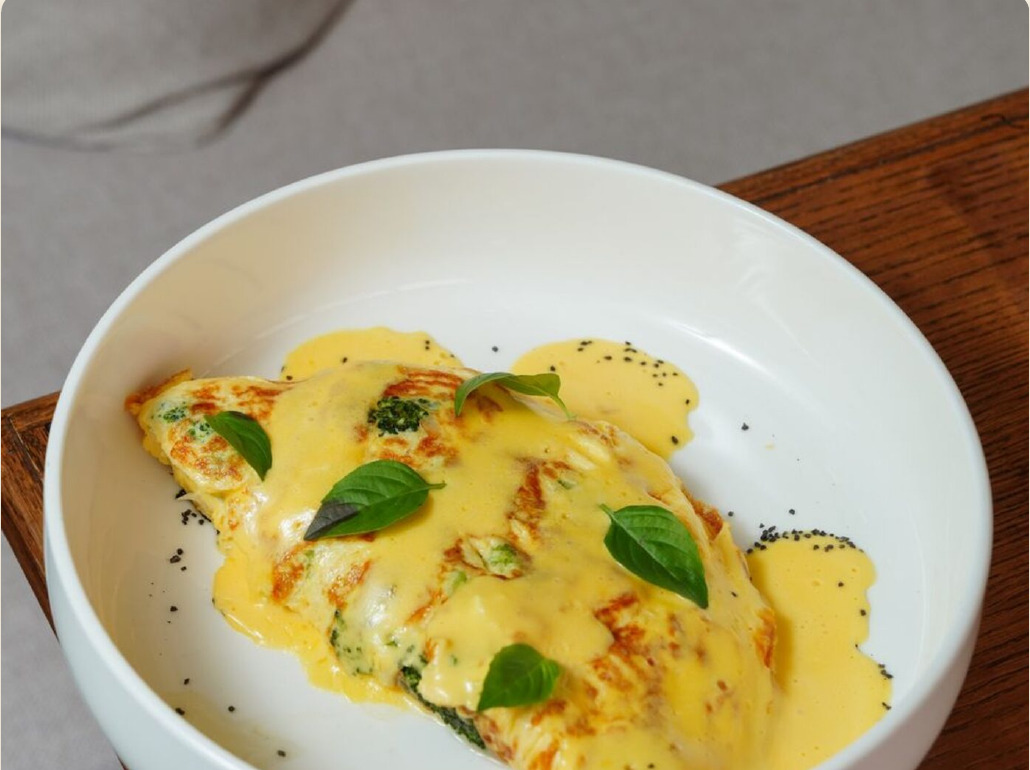Scrambled eggs with butter and basil